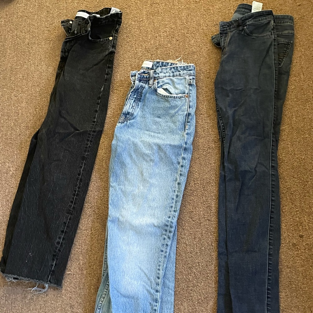 3 pairs of jeans together